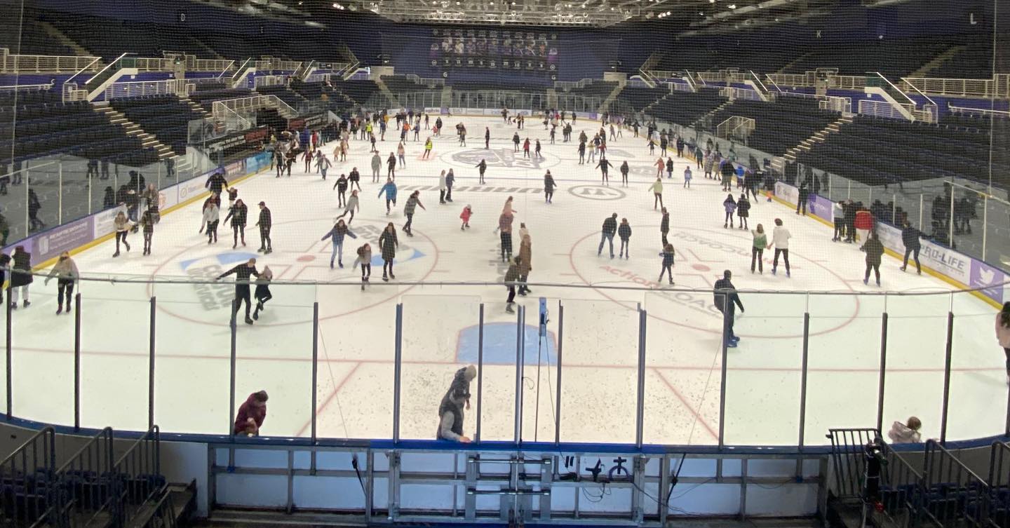 groups of people on the ice rink