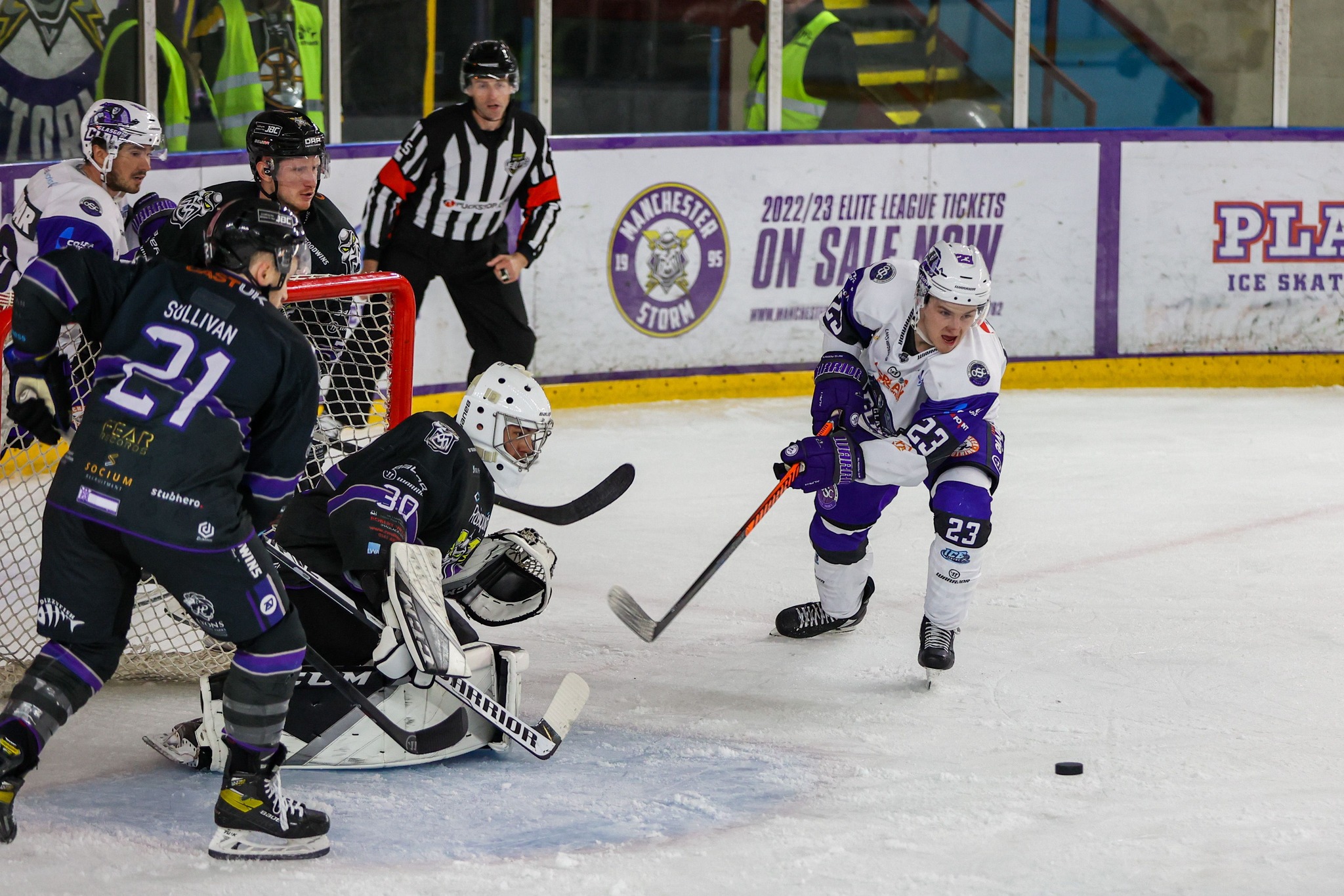 Glasgow Clan ice hockey team in action on the ice